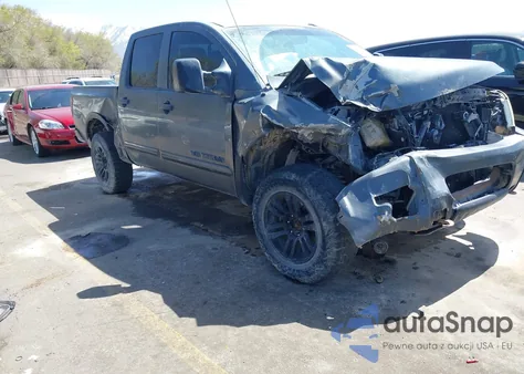 2012 Nissan Titan Pro-4X z USA, uszkodzony, nr VIN 1N6BA0EC7CN304116